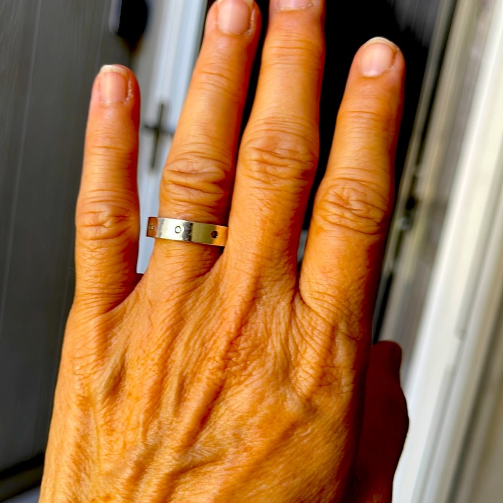 Polished Sterling Silver Ring with 8 Solitaire Diamonds